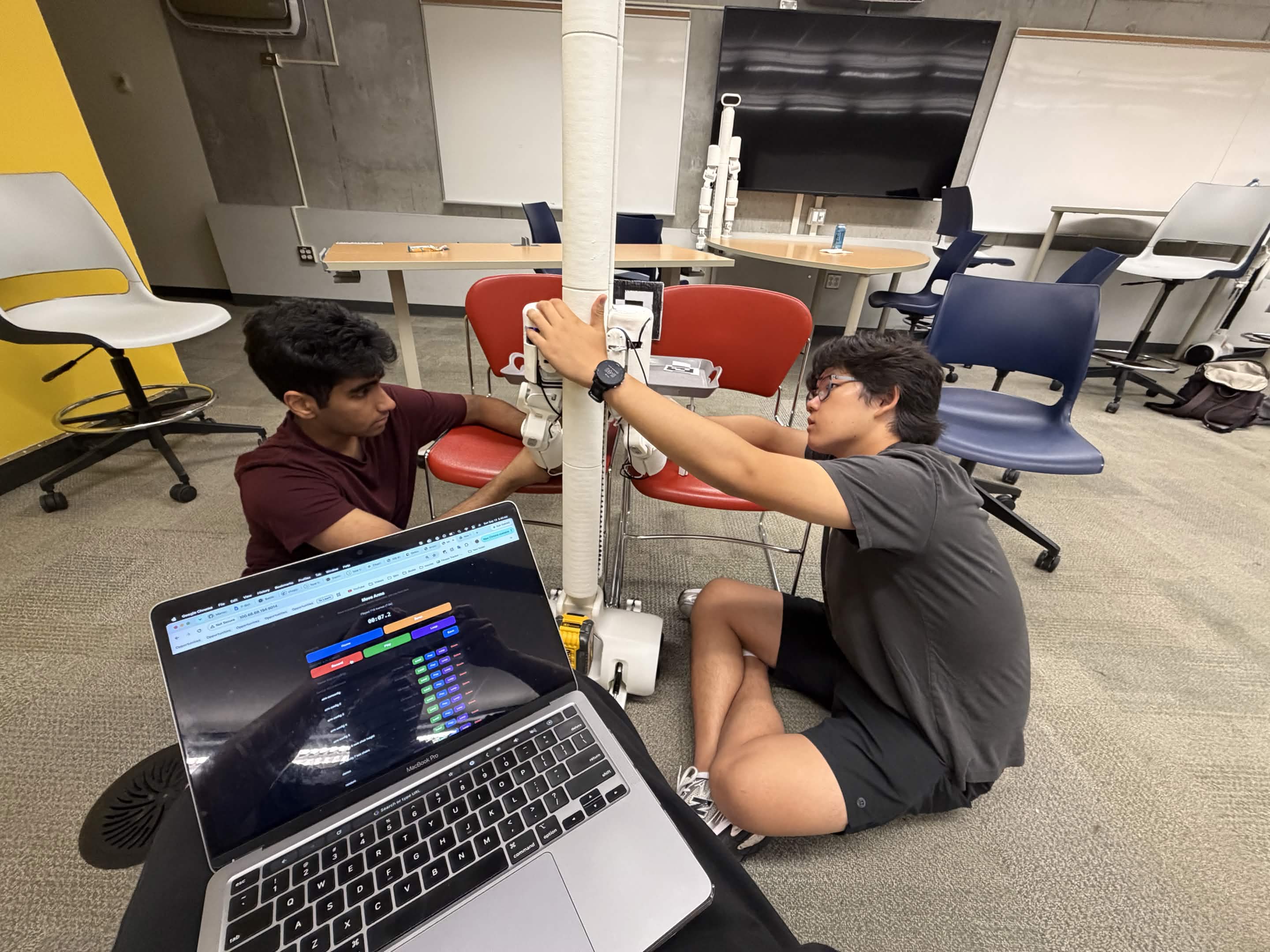 Training the tray pick-up mechanism